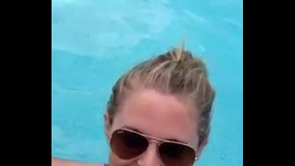 Hotwife Gives Blowjob in Public Pool to Stranger